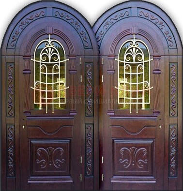 Индивидуальная арочная дверь со стеклом и ковкой ДА-19 в Дмитрове
