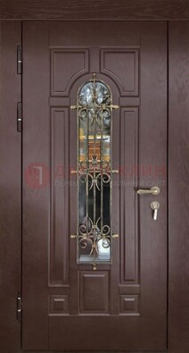 Темная железная дверь со стеклом и ковкой для частного дома ДСК-156 в Ступино
